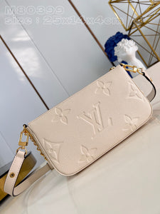 L V pochette cream 25 cm.