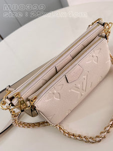 L V pochette cream 25 cm.