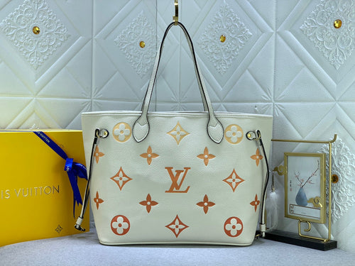 L v neverfull 31*28*14 cm.