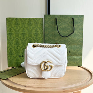G u c c i white 18*13.5*8 cm.