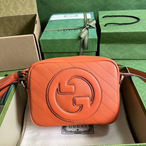 G u c c I orange soho
