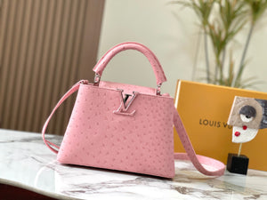 L v pink 21, 27, 31.5 cm.