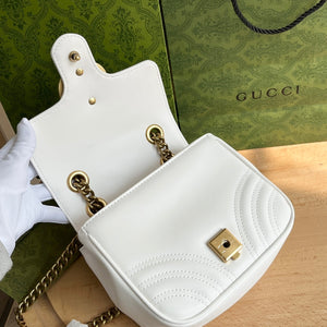 G u c c i white 18*13.5*8 cm.