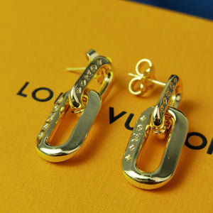 L v earrings