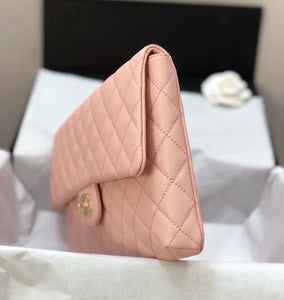 Chanel pink clutch