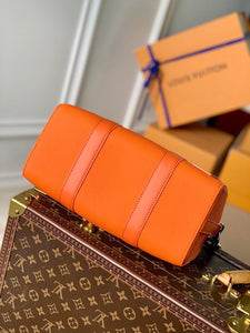 L v orange travel
