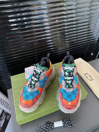 G u c c i /b a l e n c i a n g a calab orange/blue
