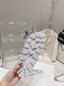 P r a d a white slides