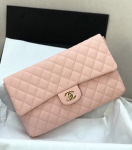 Chanel pink clutch