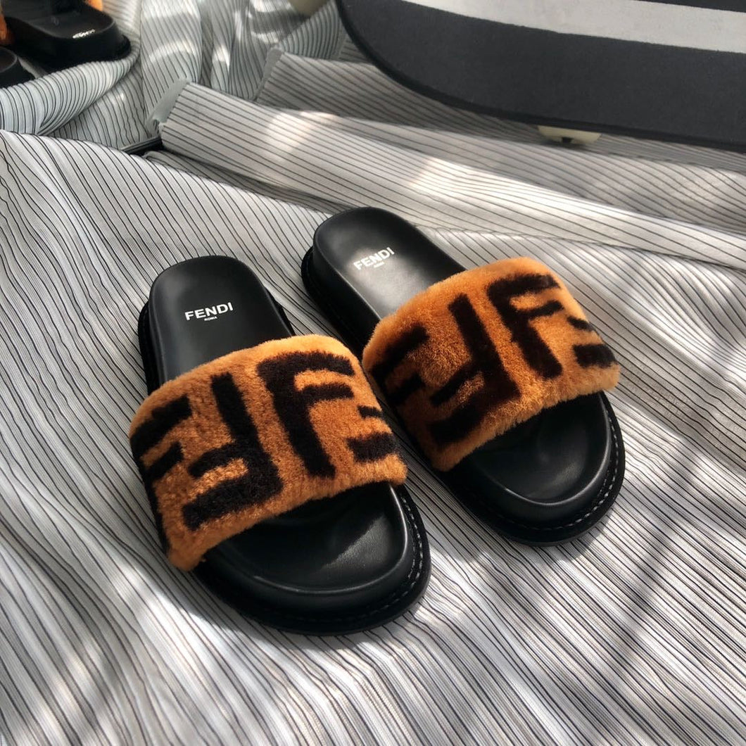 Fendi slippers DailyLuxe