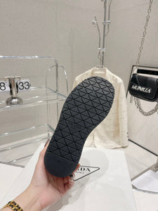 P r a d a wedge