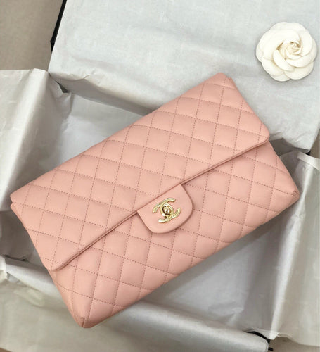 Chanel pink clutch